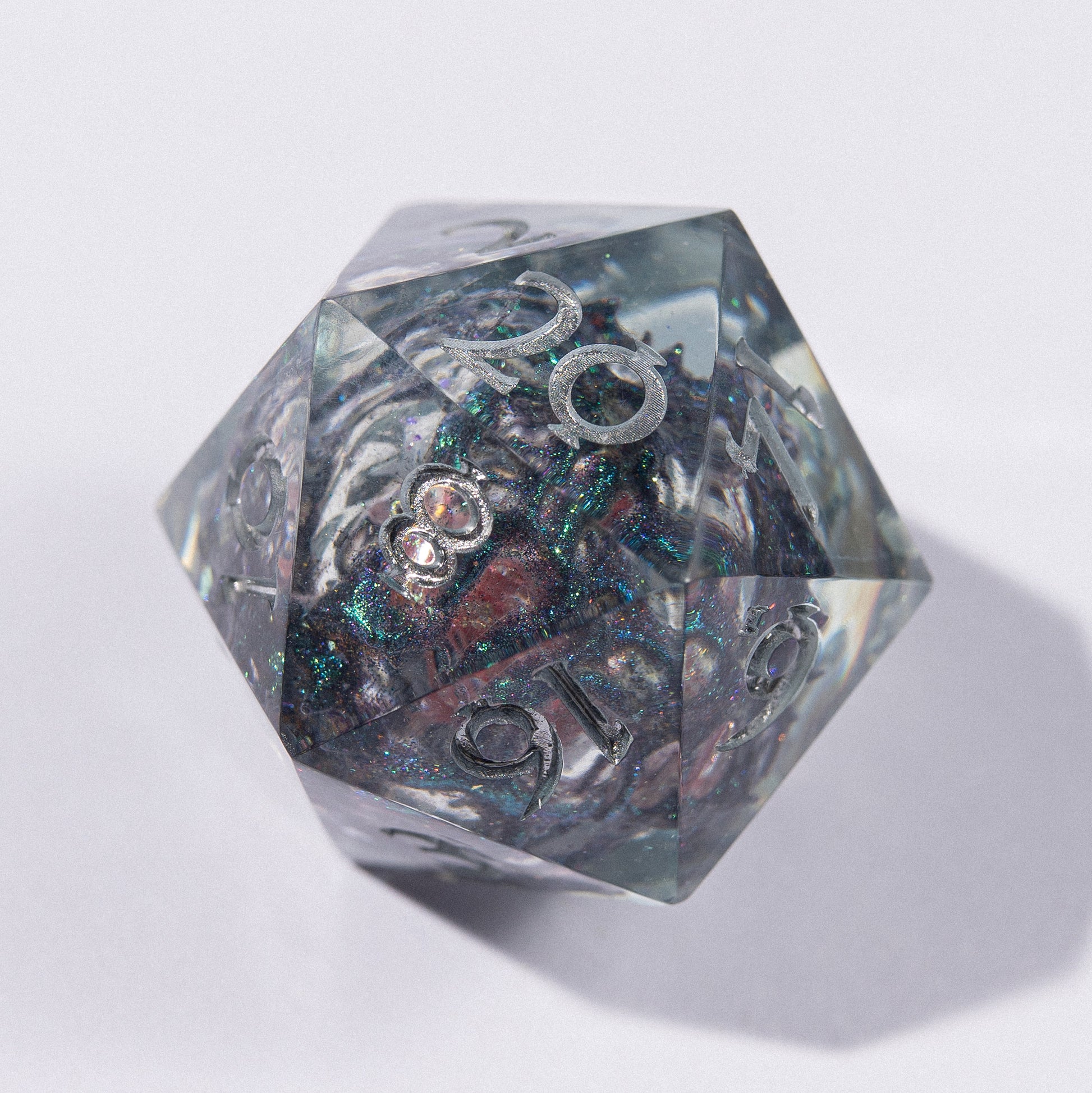 Unique designs: inspired by magic and epic adventures.
Handcrafted: made with love for detail and your gaming experience.
For play and display: perfect for DnD nights or as a collector’s treasure.
Legendary rolls: let your dice become part of every story.
Personal touch: each set carries its own character and charm.


DnD, dice, larp, fantasy, dungeons and dragons, ttrpg, handmade, Vampire: The Masquerade, dark aesthetic, dice making, resin dice, dice goblin, handmade dice, custom dice