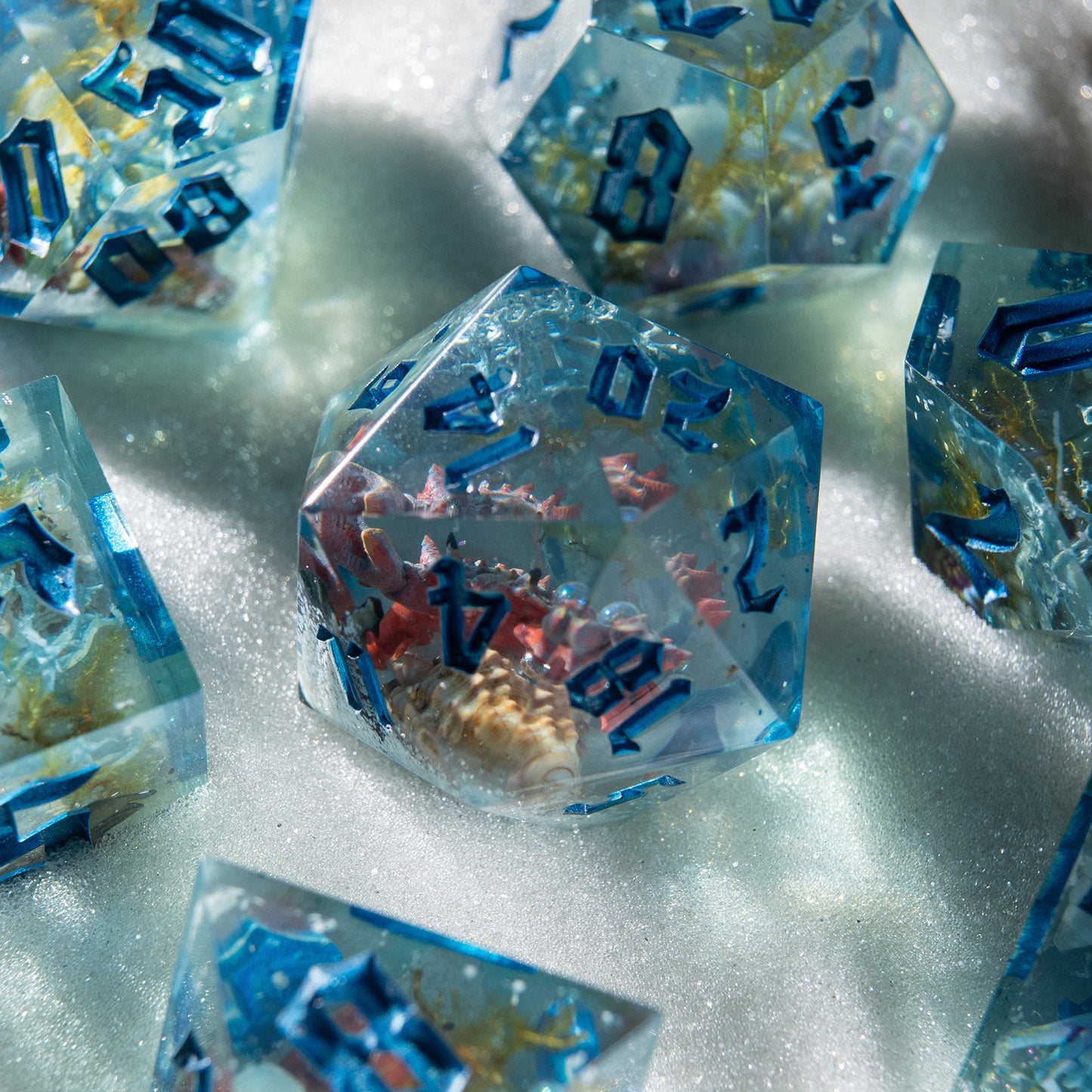 Artisan D&D dice with miniature sea crabs – fantasy resin set cast from forgotten tides.