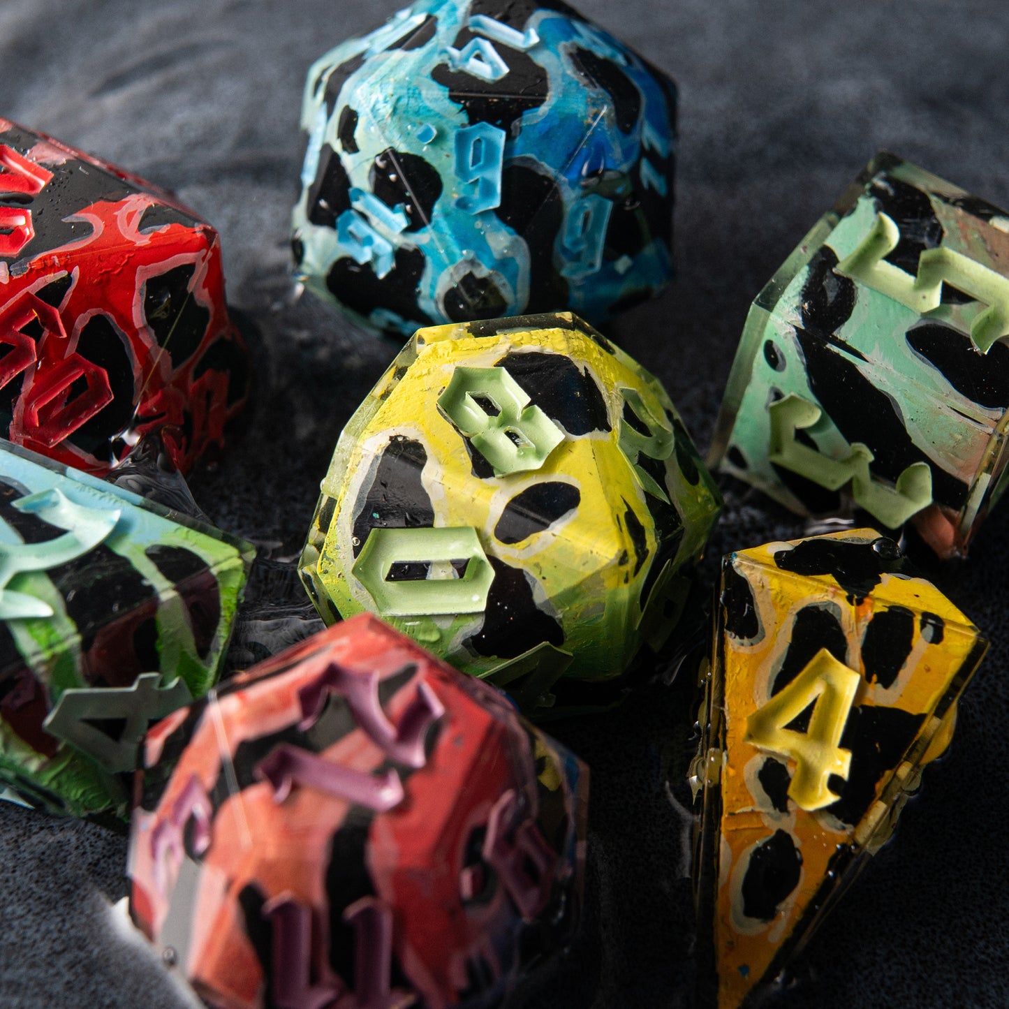 Close-up of artisan dice inspired by poisonous jungle frogs – Venom Bloom D20 for TTRPG.