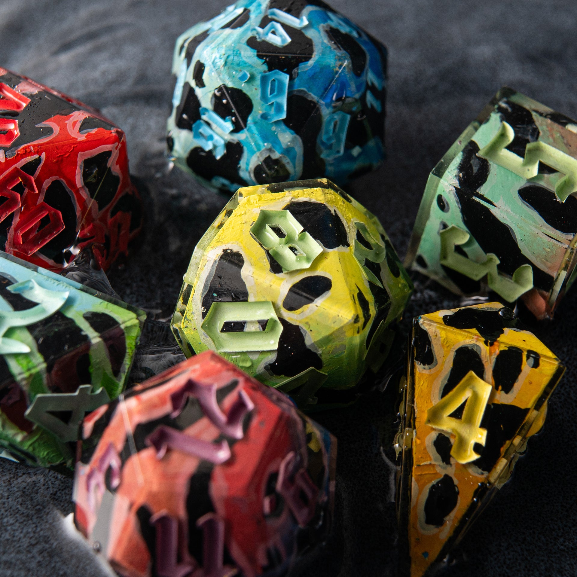 Close-up of artisan dice inspired by poisonous jungle frogs – Venom Bloom D20 for TTRPG.