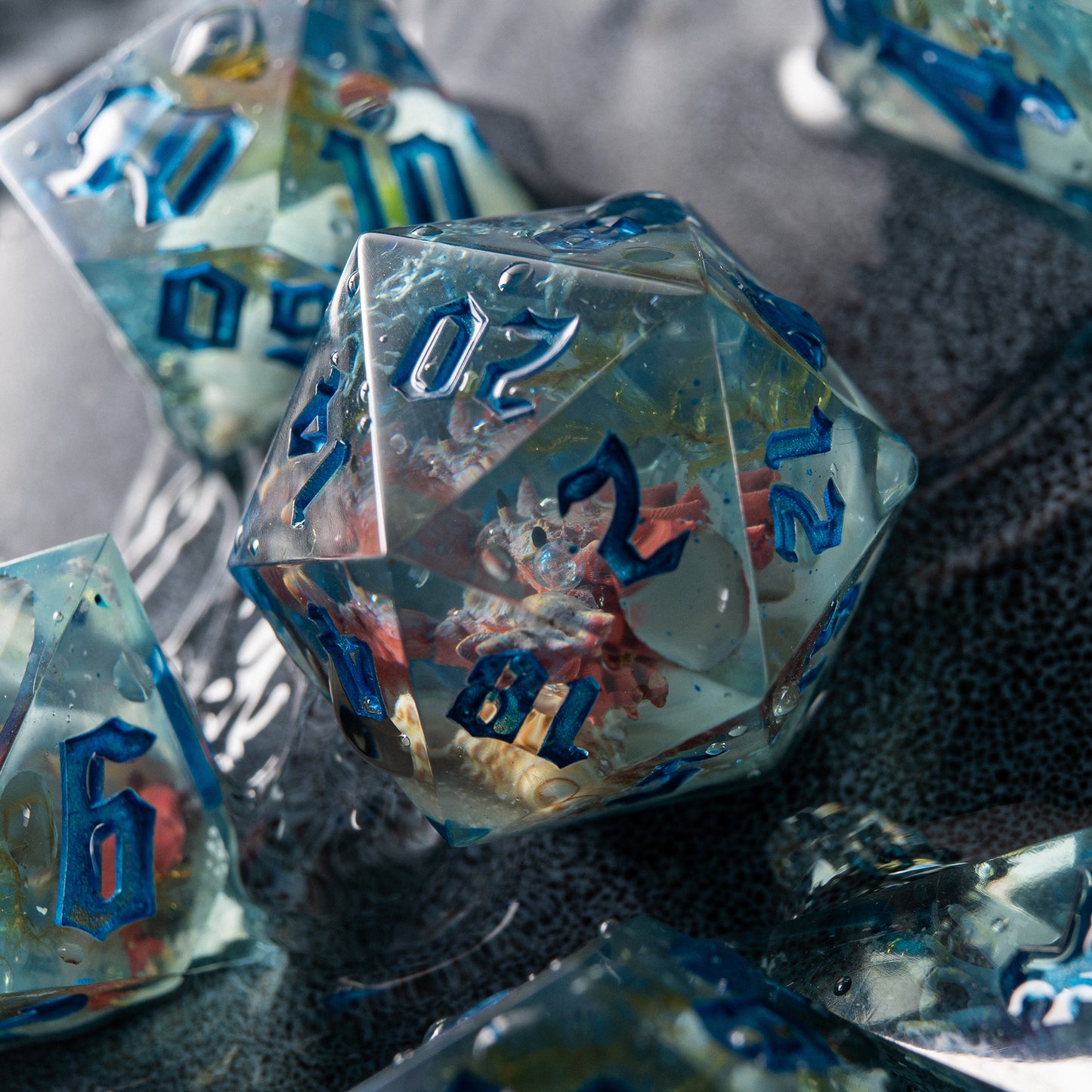 Coral and crab polyhedral dice – handmade D&D dice inspired by drowned sailor legends.