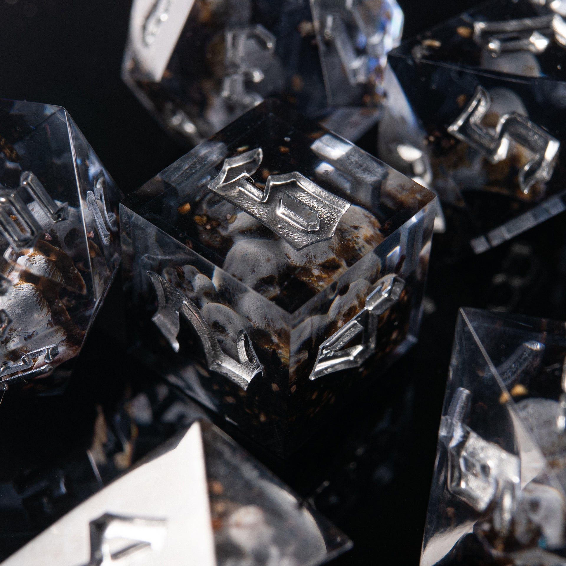 Unique artisan dice with ghostly figurines inside – ideal for necromancers and cursed characters.