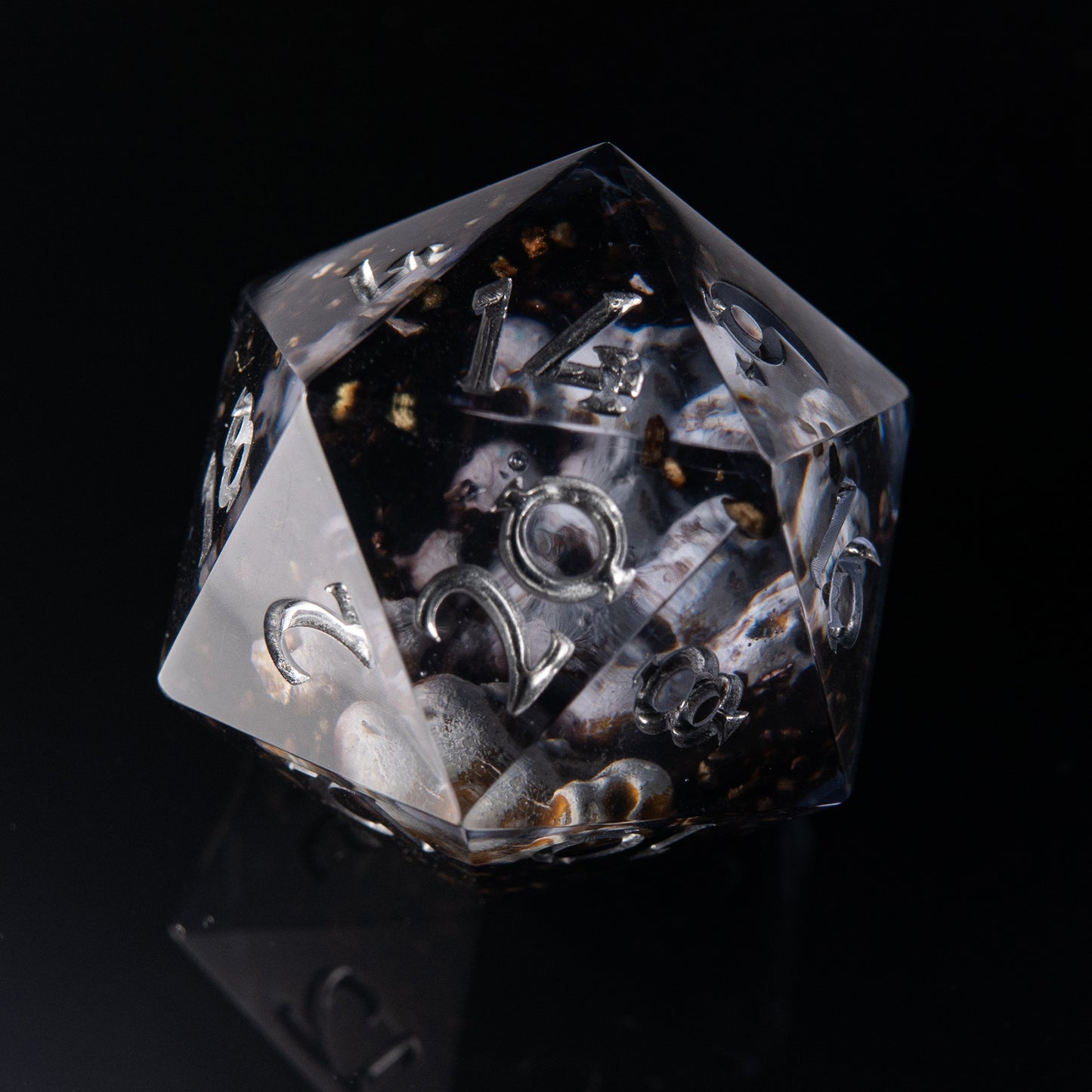 Unique artisan dice with miniature skulls – Prison of Souls D&D dice set.