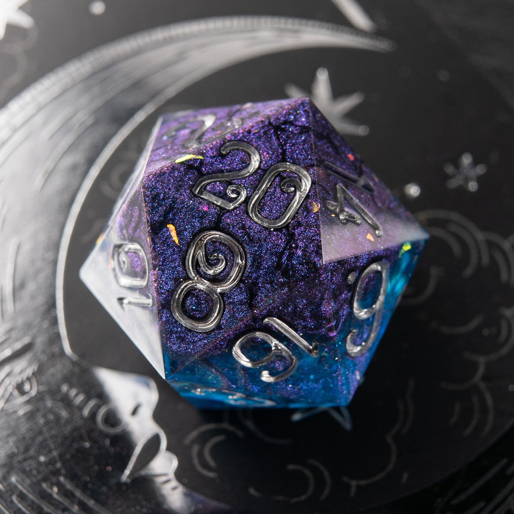 Stellar Veil handmade resin D20 – purple and blue cosmic polyhedral dice for D&D and tabletop RPG.