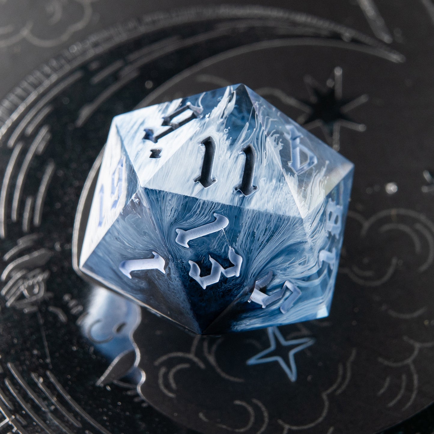 Frostbite handmade resin D20 – icy blue polyhedral dice for Dungeons & Dragons.