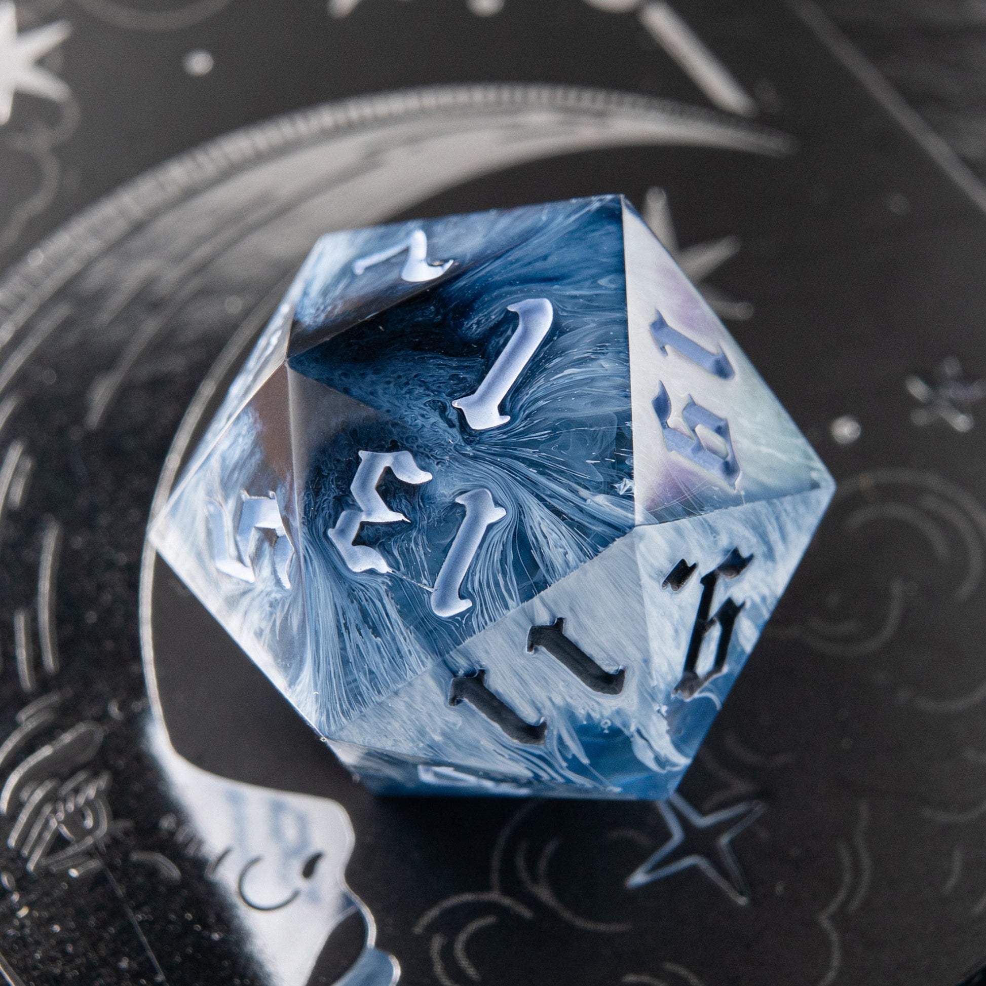Frostbite artisan dice – cold marble effect resin D20 for tabletop RPG.