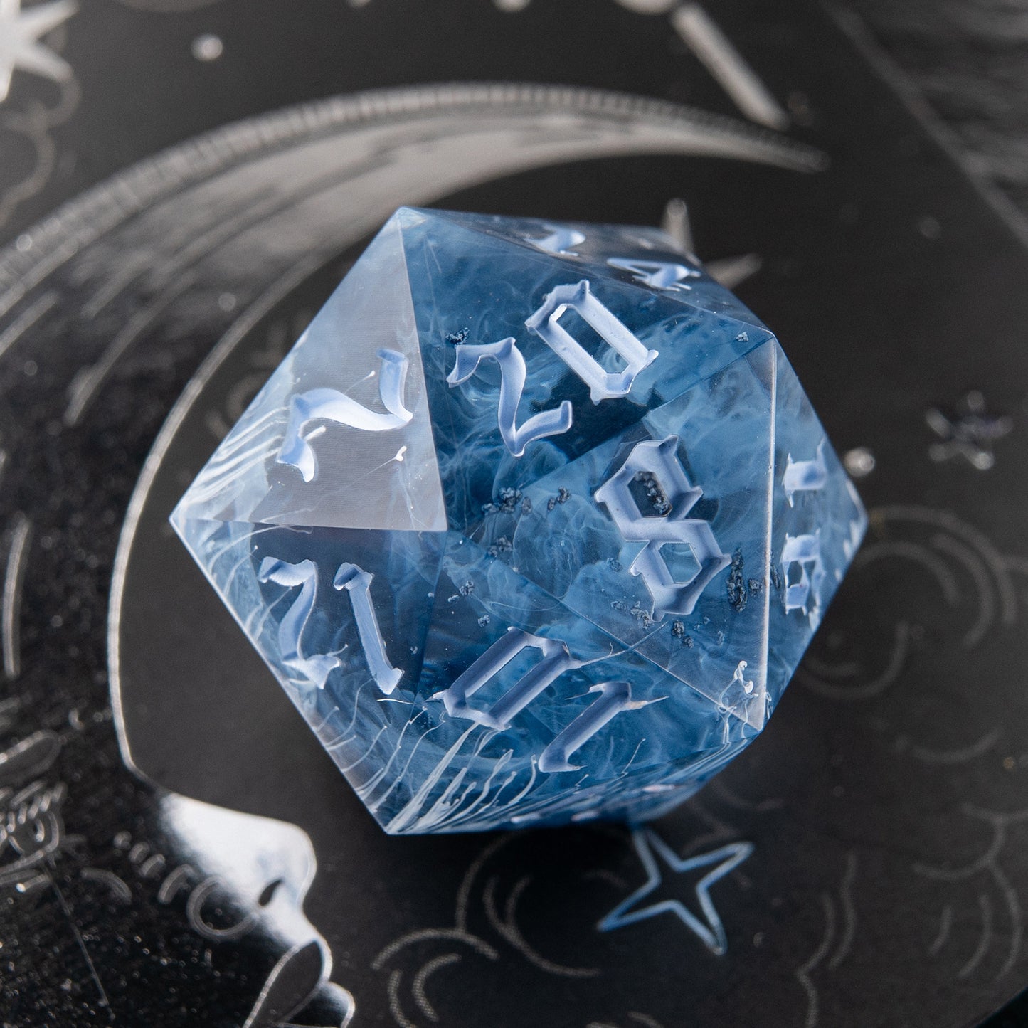 Handmade D20 Frostbite – custom blue and white resin dice for role-playing games.
