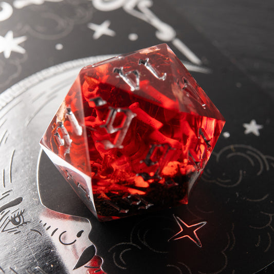 Blood Omen handmade resin D20 – red polyhedral dice with skeleton inside for Dungeons & Dragons.