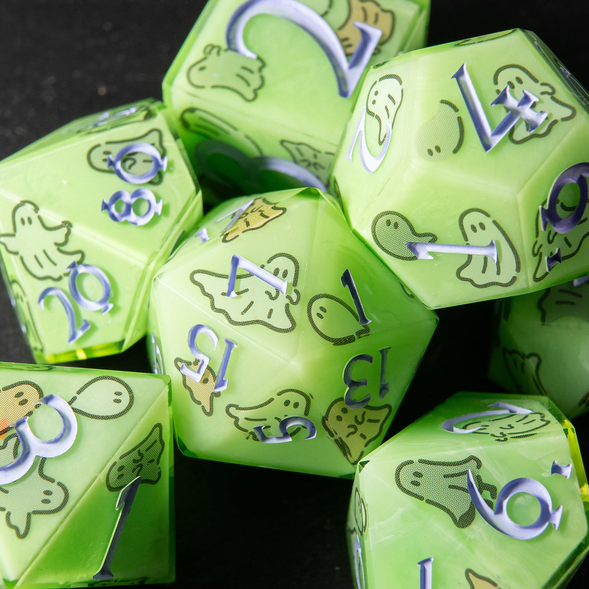 Haunted Glow handmade resin dice set – green polyhedral D&D dice with cute ghost designs.