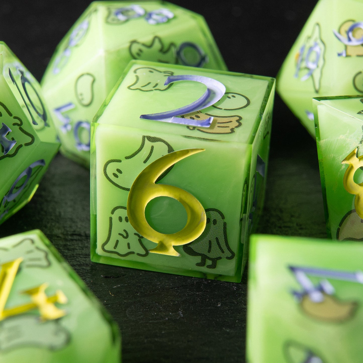 Haunted Glow resin dice – playful green handmade dice with ghost motif for tabletop RPG.