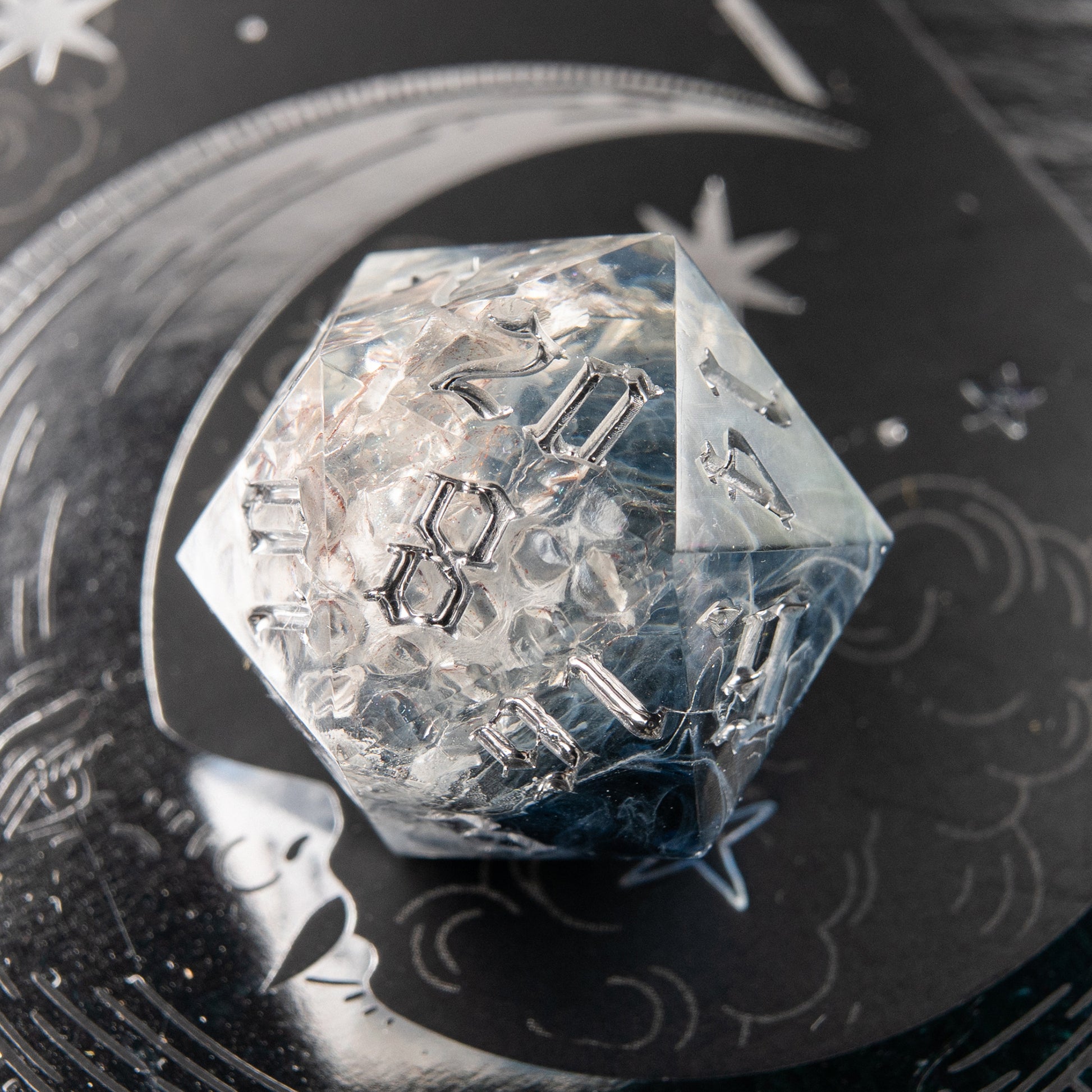 Frozen Serpent resin dice – handmade polyhedral D20 with snake motif for collectors.